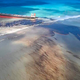 Oil leaks from the MV Wakashio, a bulk carrier ship that recently ran aground off the southeast coast of Mauritius, in what the island nation has now declared an environmental emergency.